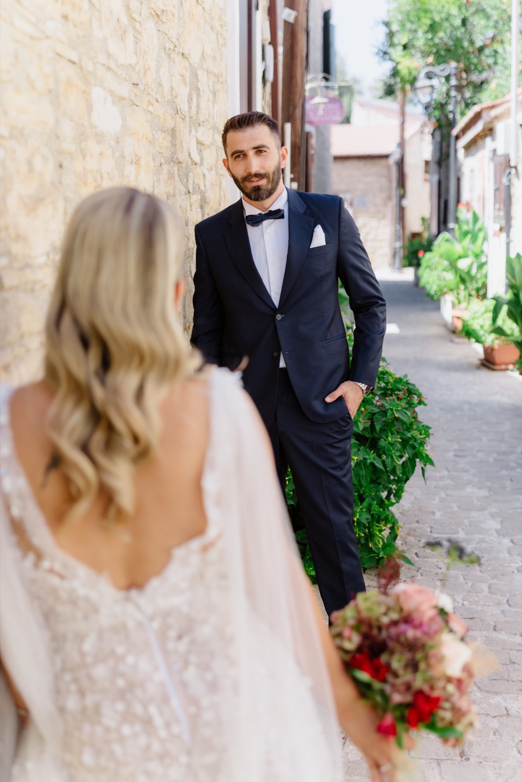 Giorgos seeing Andriana in her wedding dress in a Cyprus village lane